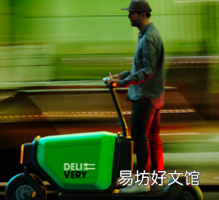 查看Scootility实用货运电动滑板车配有可更换电池等